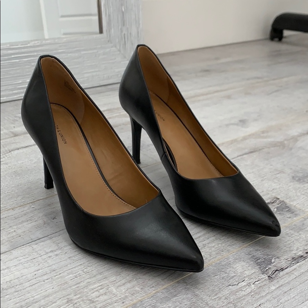 Black short heel pumps